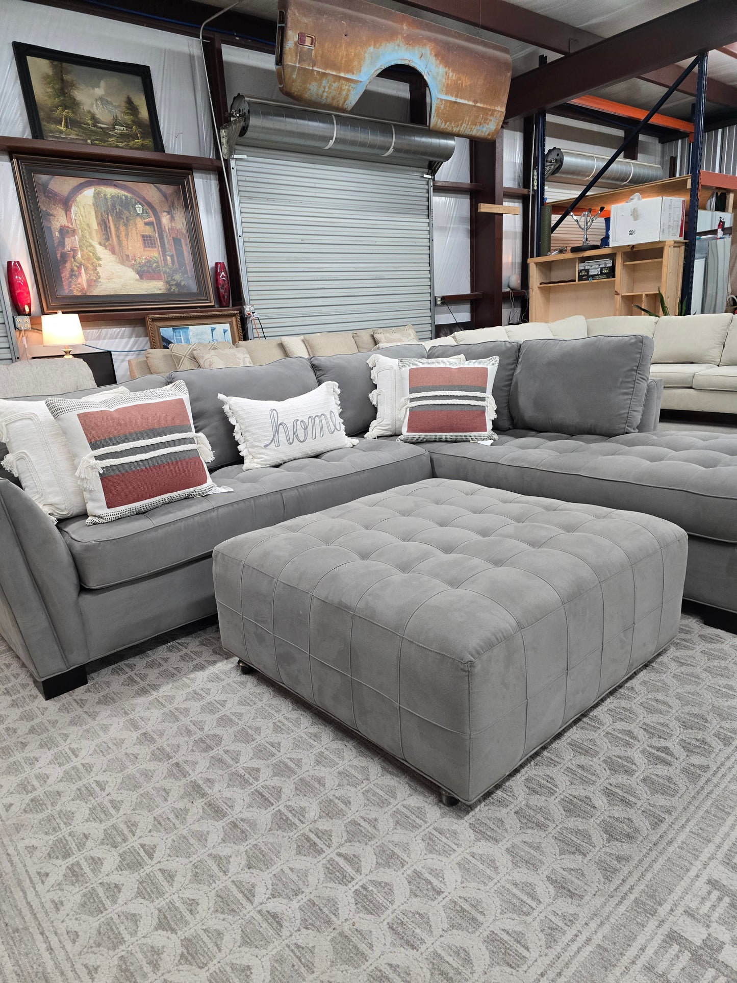Gray Sectional Couch with Rolling Ottoman – Rooms To Go