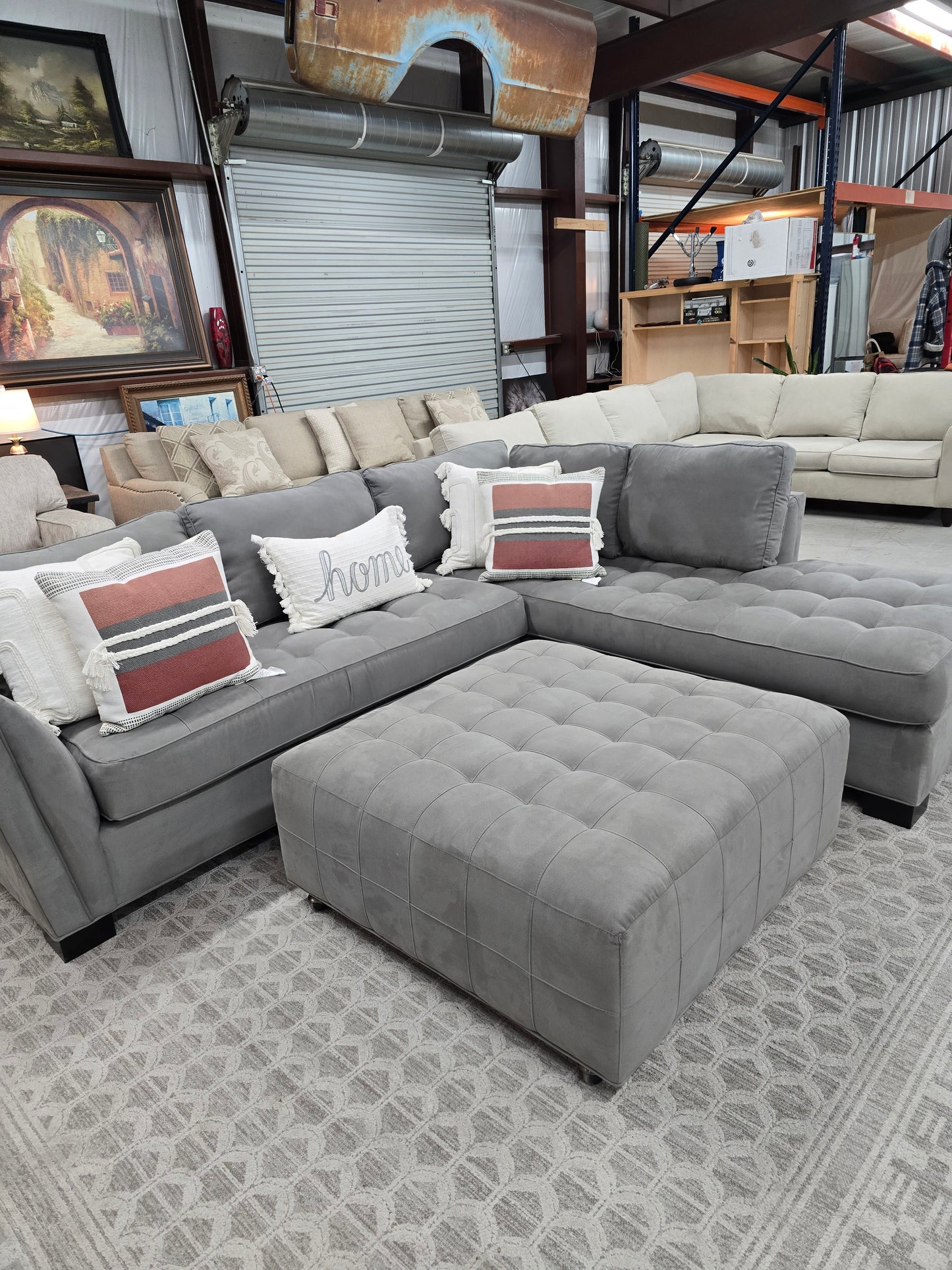 Gray Sectional Couch with Rolling Ottoman – Rooms To Go