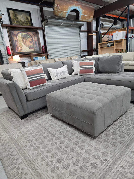 Gray Sectional Couch with Rolling Ottoman – Rooms To Go