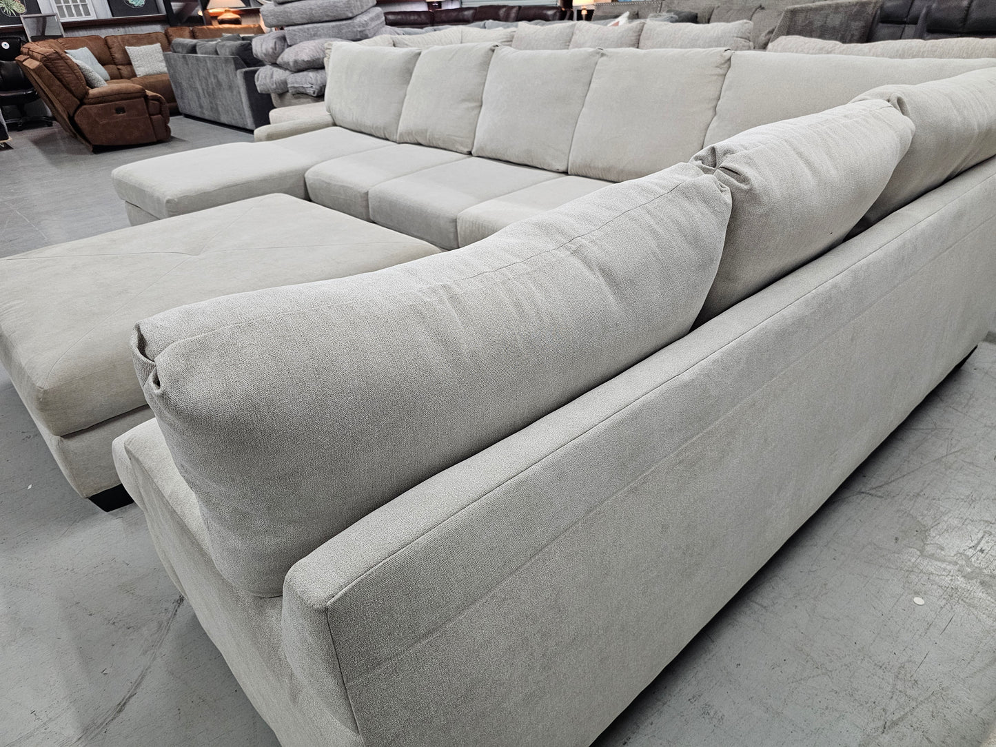 Oversized Beige U-Shaped Sectional Couch with RAF Chaise Lounge & Ottoman – Living Spaces - D38