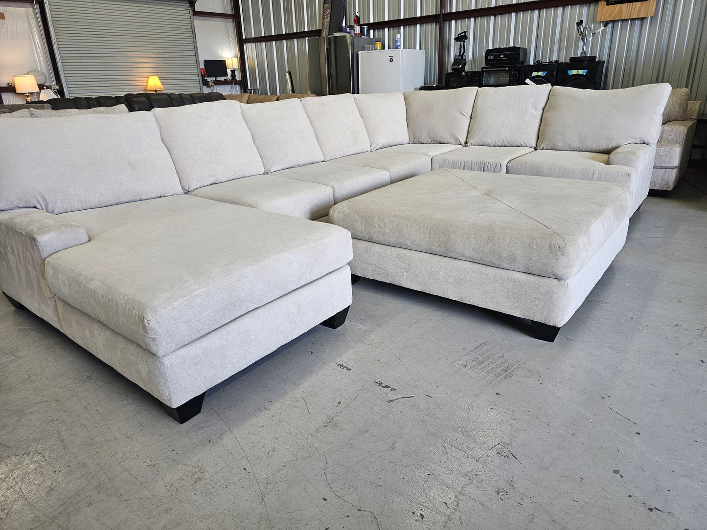Oversized Beige U-Shaped Sectional Couch with RAF Chaise Lounge & Ottoman – Living Spaces - D38