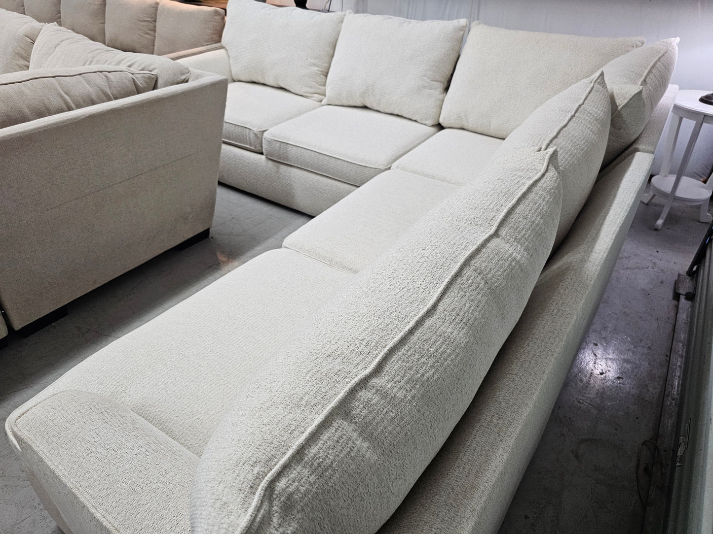 L-Shaped Beige Living Spaces Sectional Couch - D51