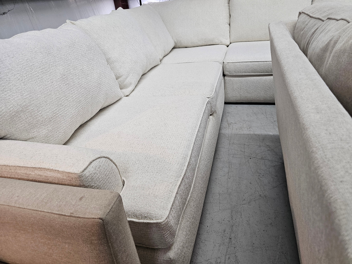 L-Shaped Beige Living Spaces Sectional Couch - D51
