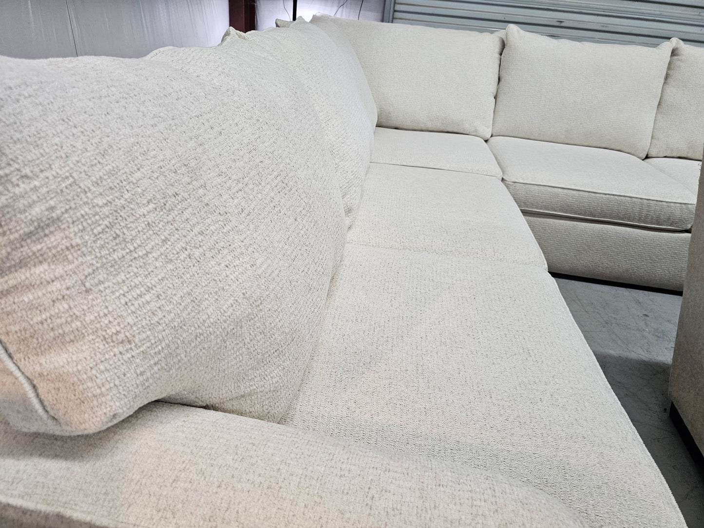 L-Shaped Beige Living Spaces Sectional Couch - D51