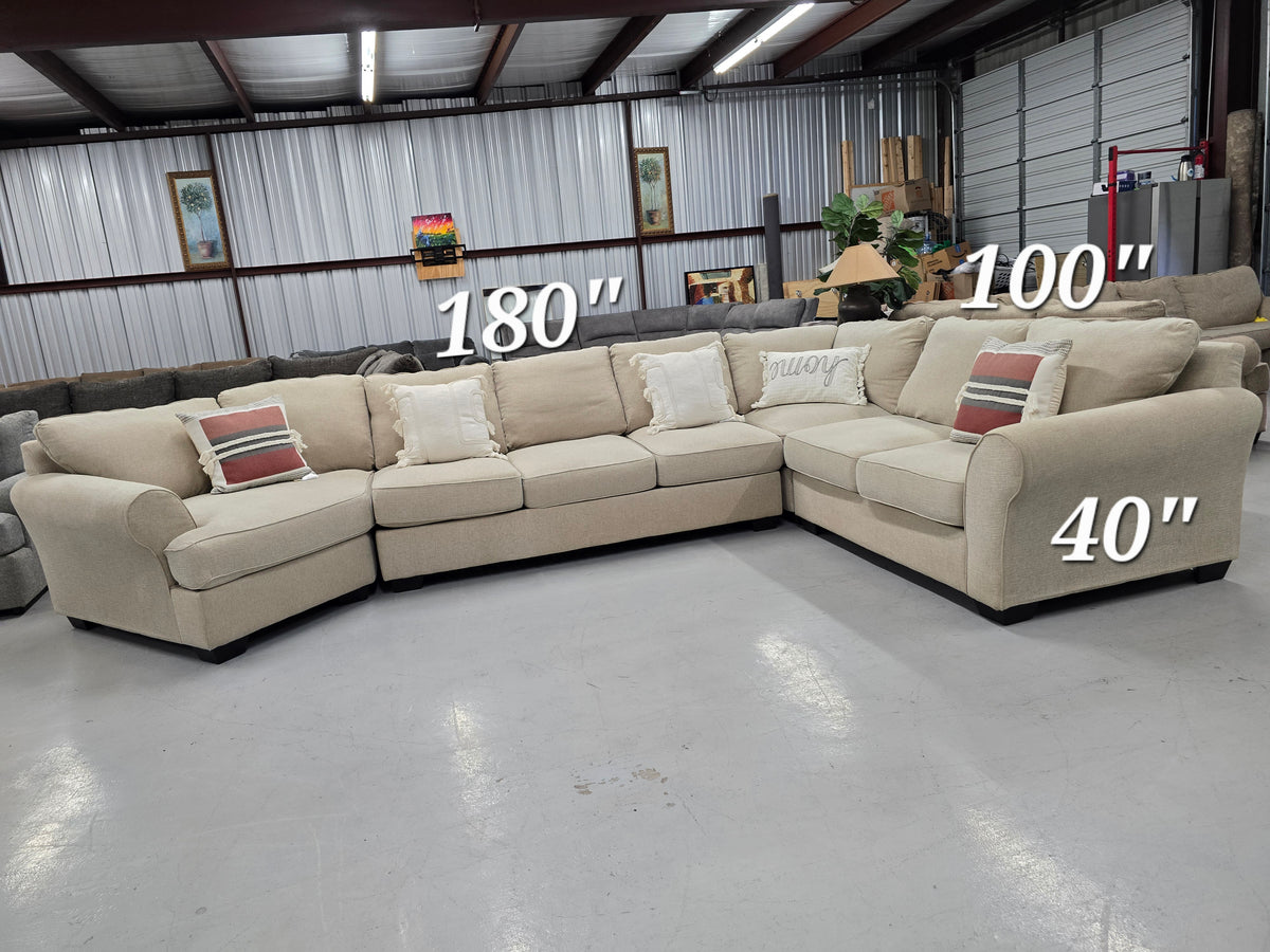 Beige Sectional with ottoman - D111